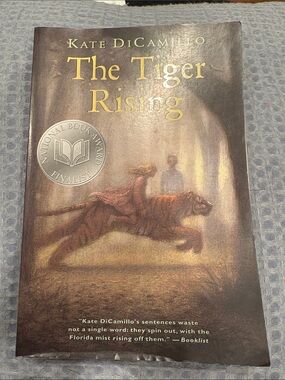 The Tiger Rising by Kate DiCamillo - Brown/Gold Paperback